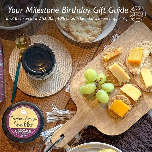 A close up of a cheeseboard depicting our gifts available for different milestone birthdays.
