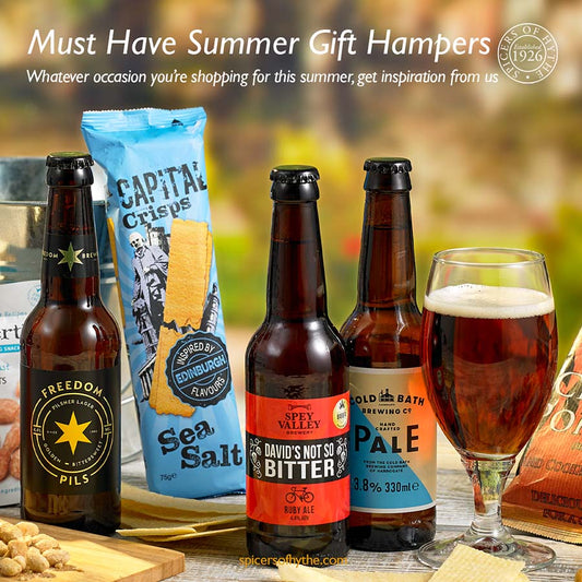 Bottles of beer on a table top in the sunshine