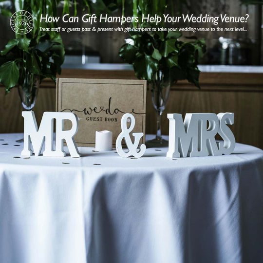 A wedding table with Mr & Mrs sat on the top, alongside a place to send your wedding messages.