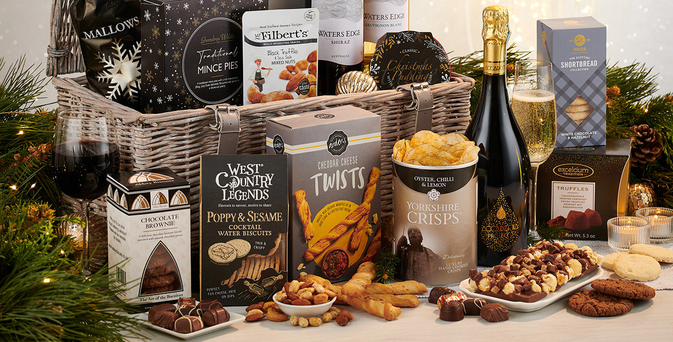 Take a look at the specialist Christmas hamper baskets, hand-packed into wicker baskets to bring the traditional Christmas feel like this hamper pictured. Including Prosecco, Wine, Crisps and more.