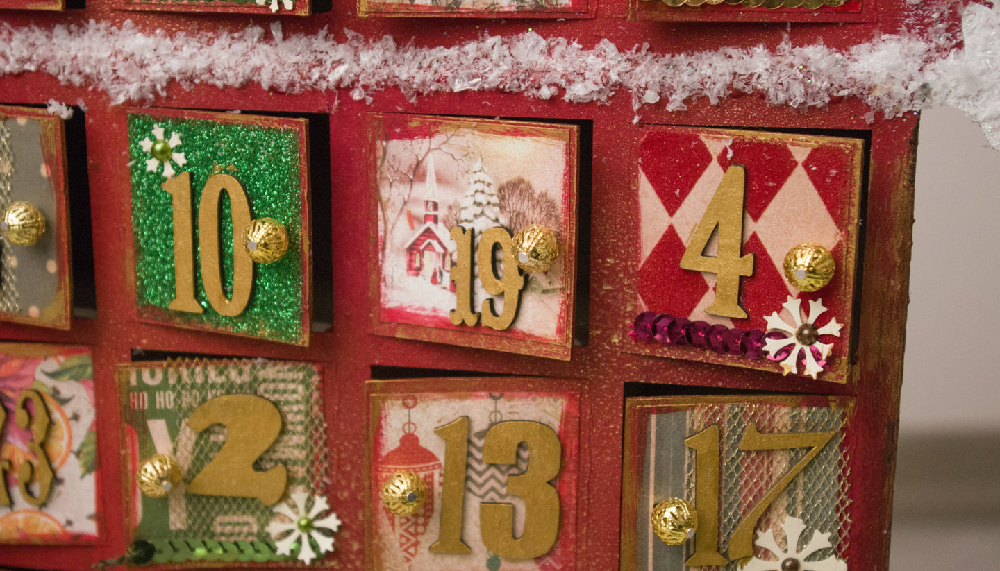 An image showing a festive Christmas advent calendar, with doors for the different days of Christmas.